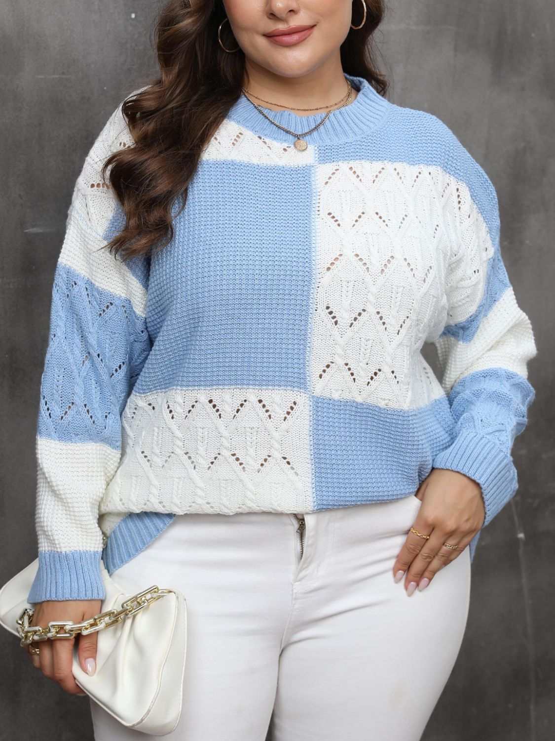 Plus size openwork color block long sleeve sweater in blue and white.