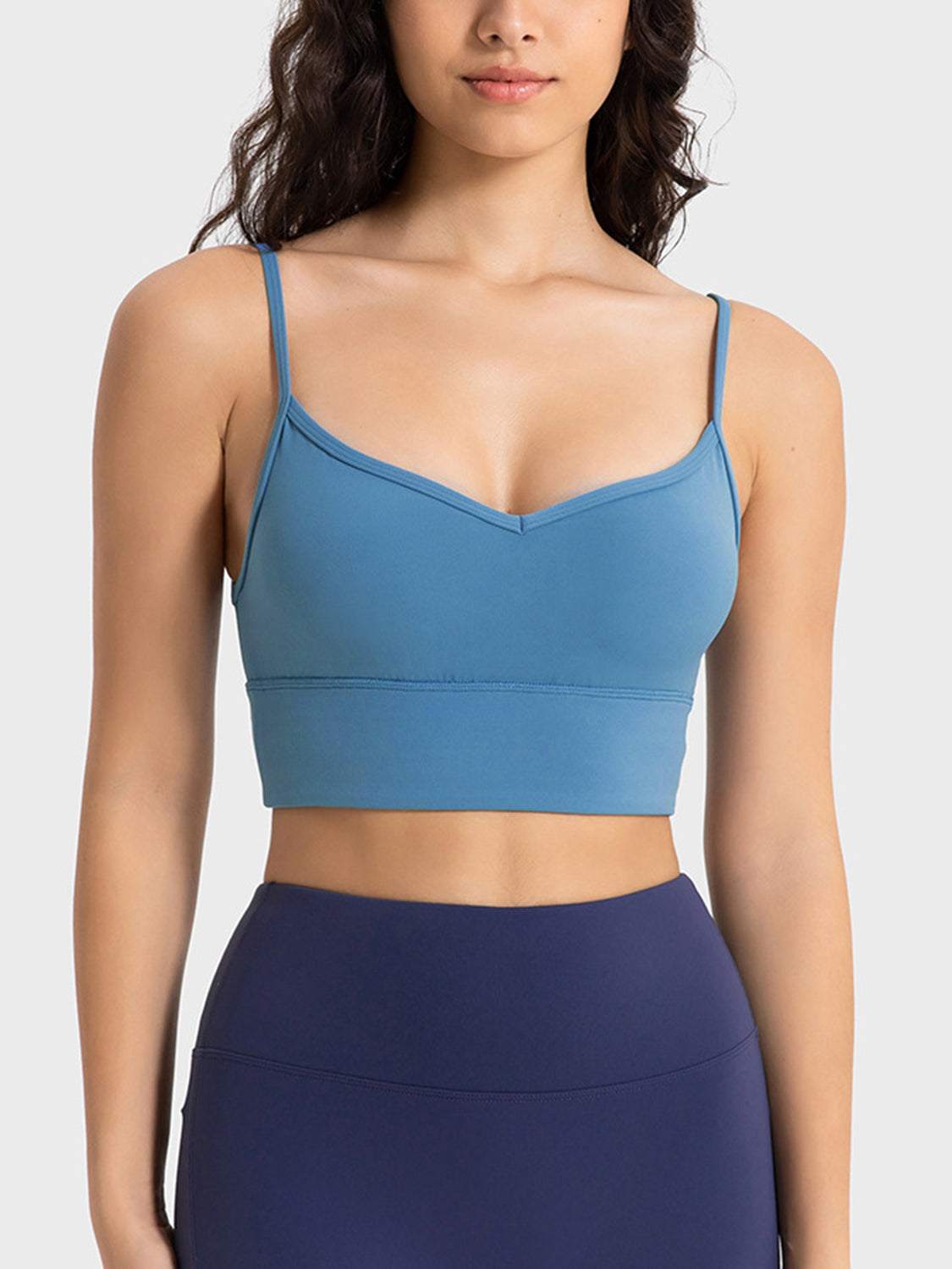 Millennia Spaghetti Strap Sport Bra in blue with removable padding, stretchy nylon-spandex blend.