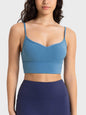 Millennia Spaghetti Strap Sport Bra in blue with removable padding, stretchy nylon-spandex blend.