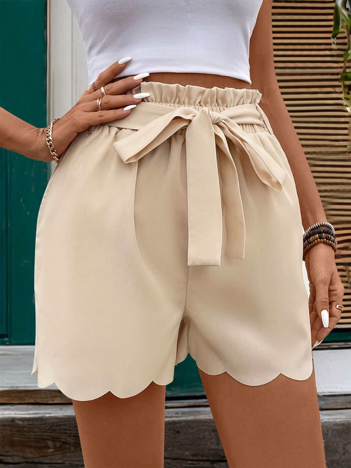 Perfee Frill Tied Shorts with Pockets, beige, 100% polyester, elastic waist, summer style.