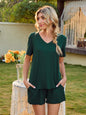 V-Neck Short Sleeve Top and Pocketed Shorts Lounge Set in green worn outdoors.