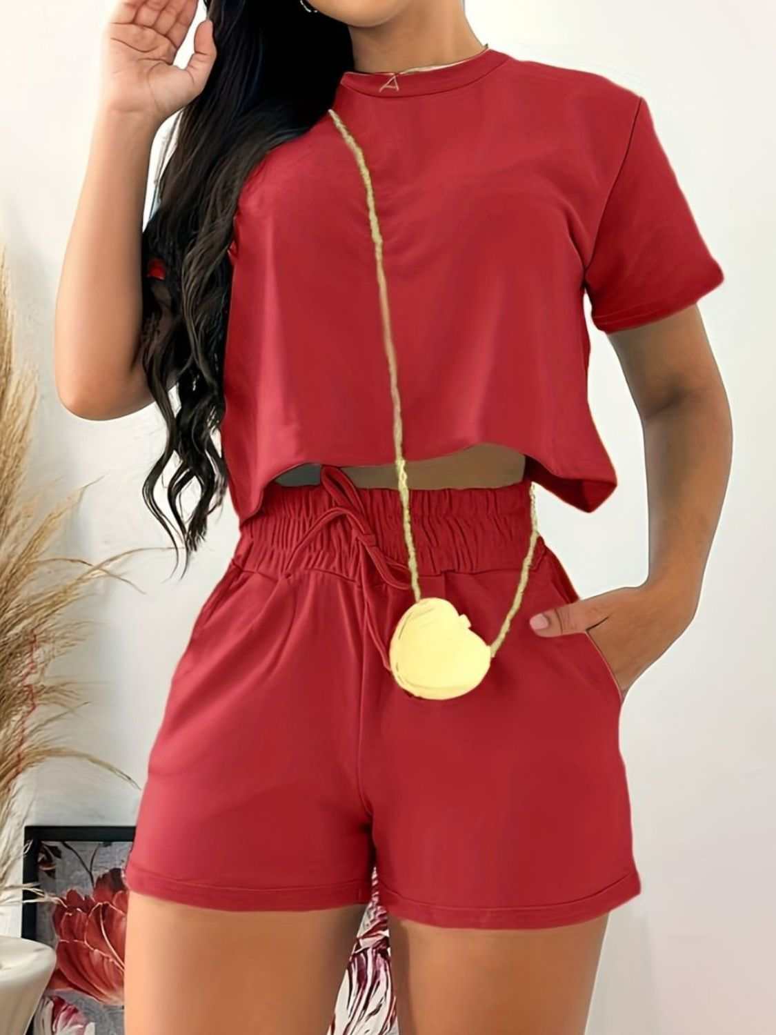 Full size round neck short sleeve top and shorts set, red, features pockets and tie, 100% polyester.