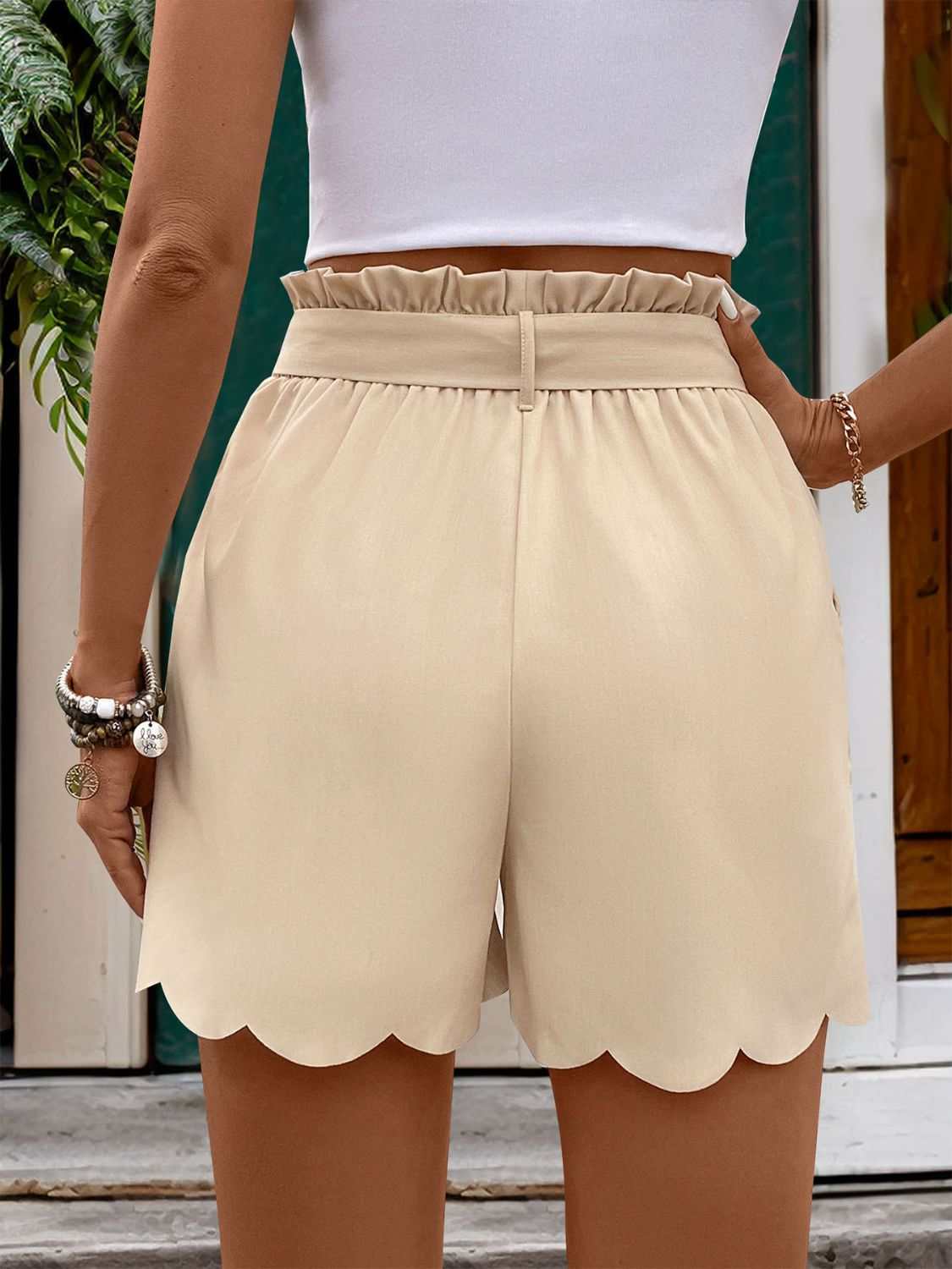 Perfee Frill Tied Shorts with Pockets, beige, scalloped hem, 100% polyester.