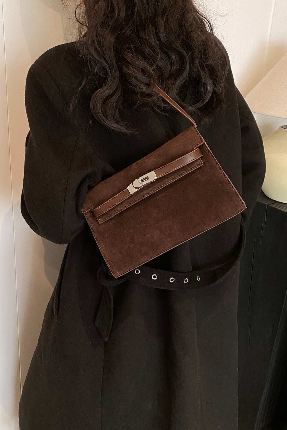 Small brown suede PU leather strap shoulder bag worn over shoulder.