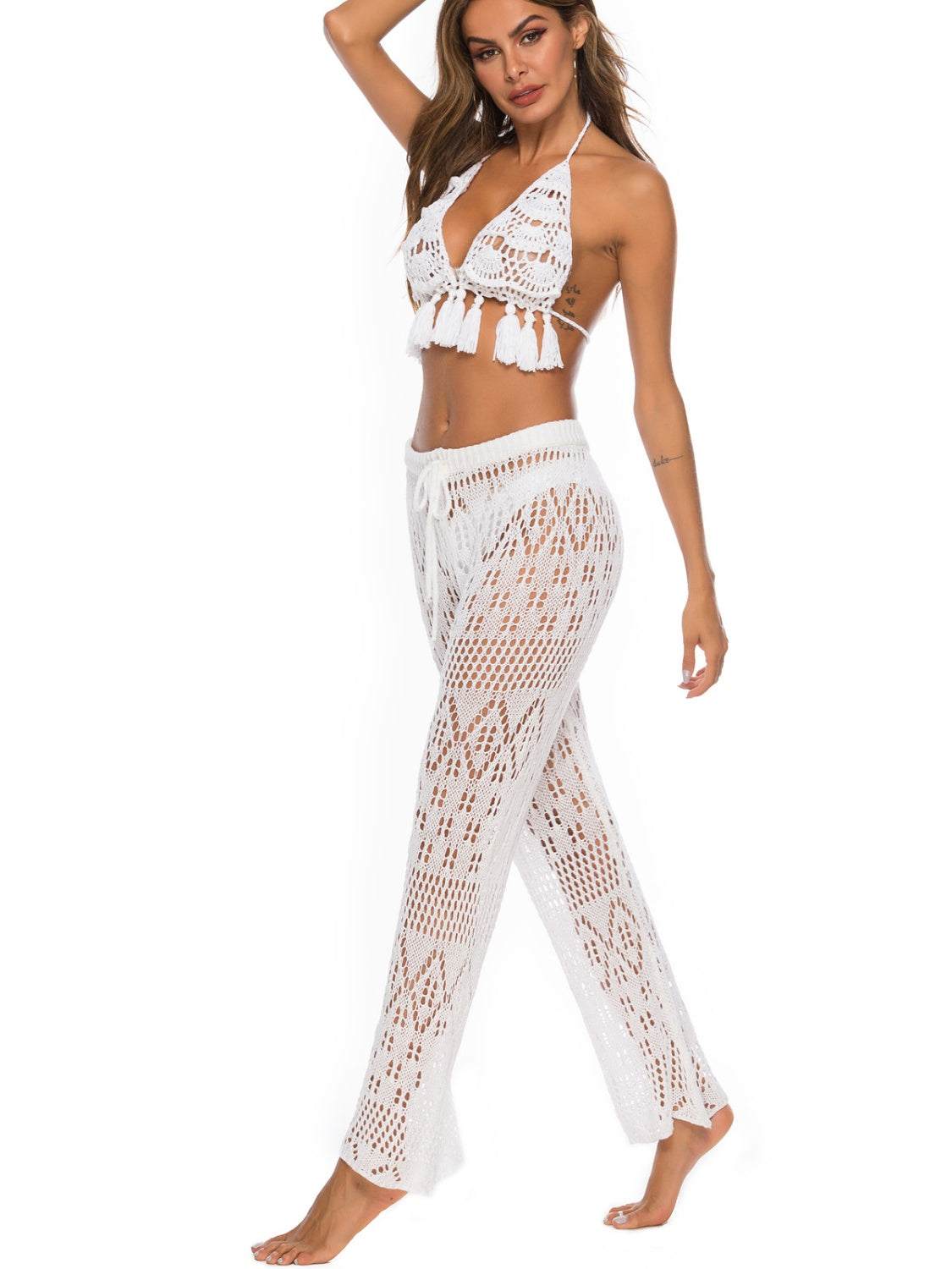 Cutout straight swim pants with moderate stretch polyester in white.