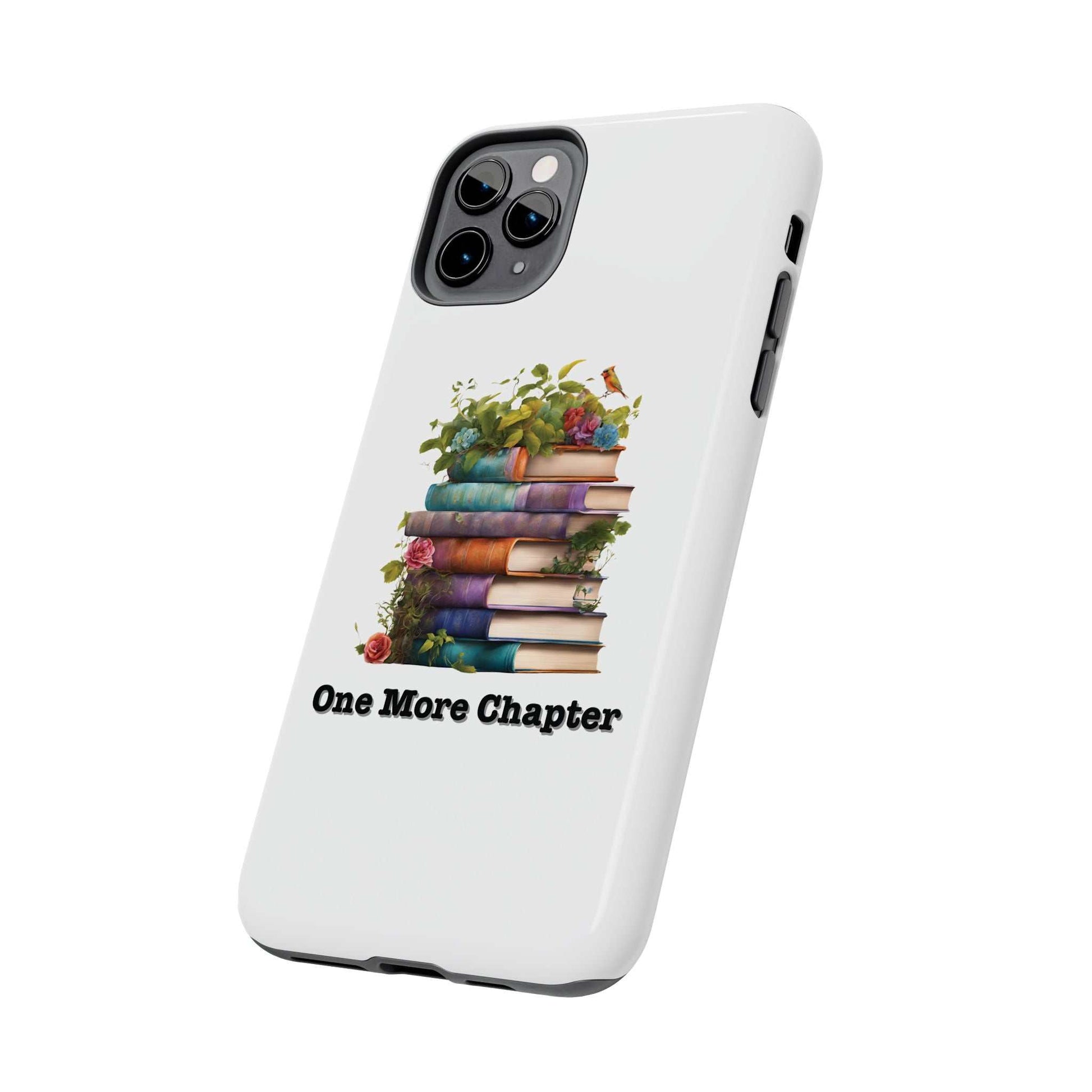 Phone case with a colorful book pile design and "One More Chapter" text.