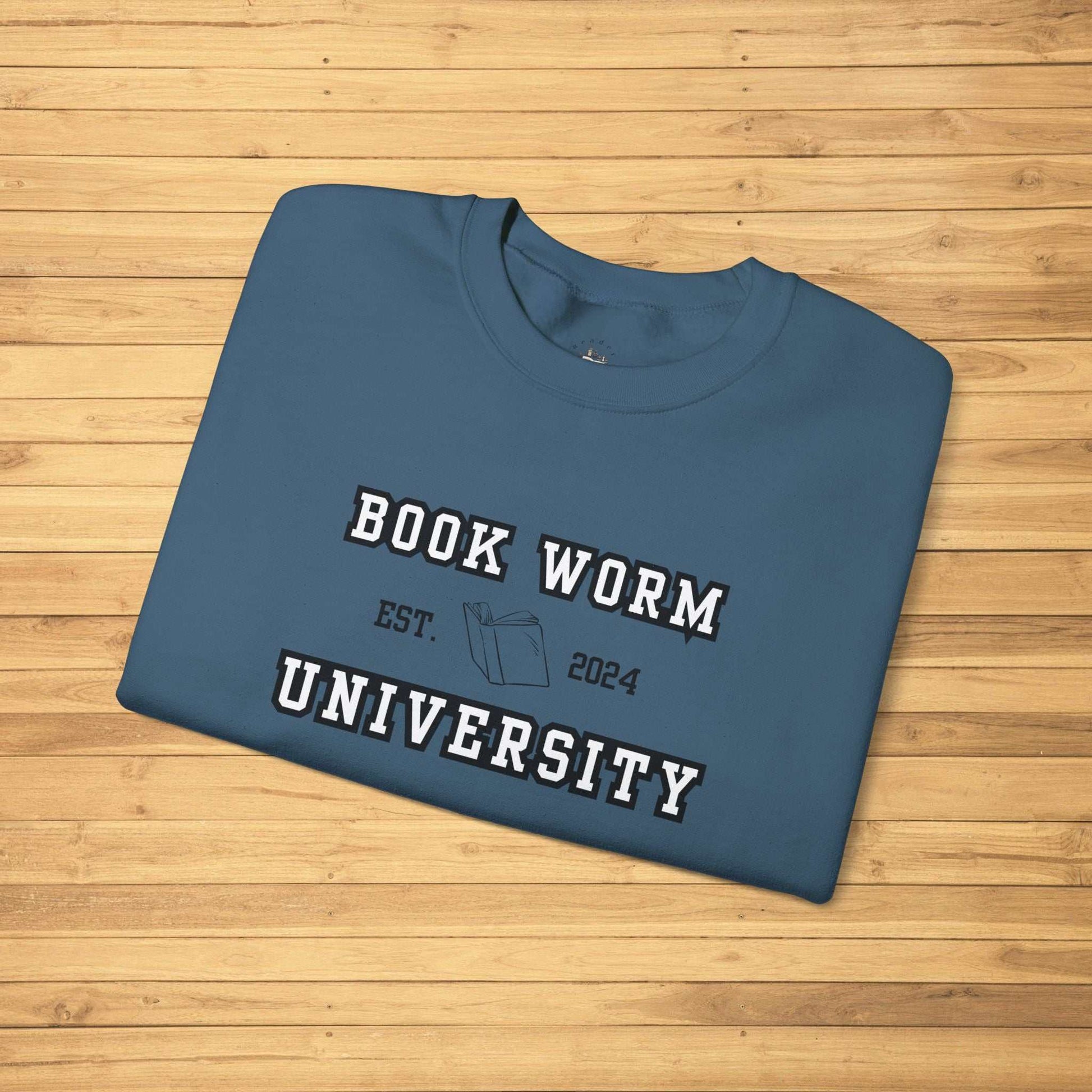 Bookworm University Crewneck Sweatshirt with Est 2024 design on blue fabric.