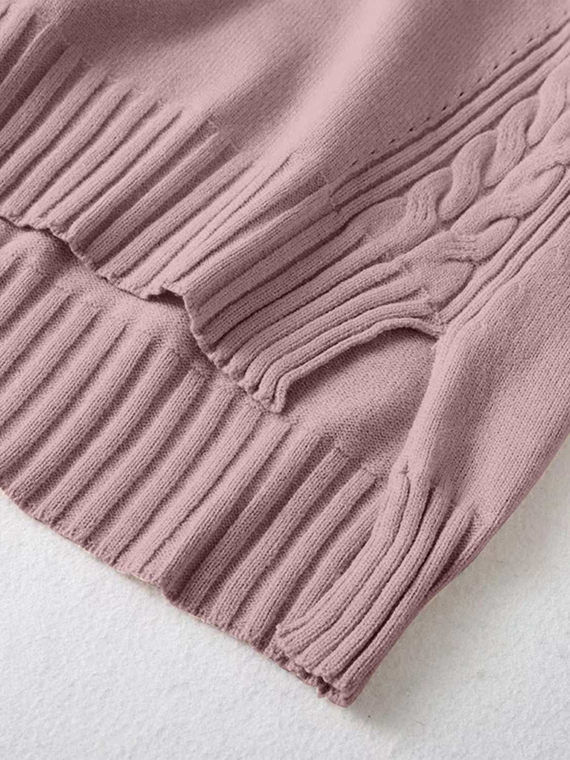 Close-up of Slit V-Neck Long Sleeve Top showcasing detailed knit texture and ribbed trim in mauve.