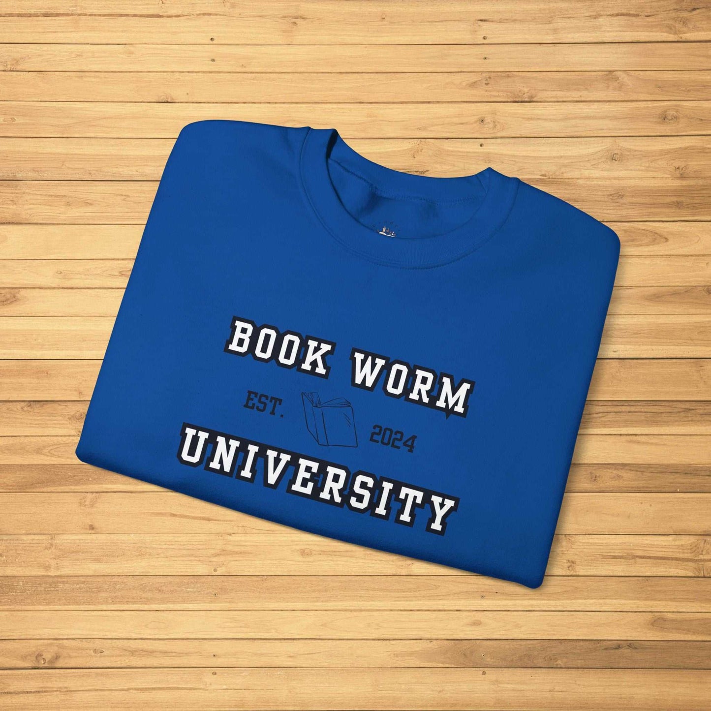 Royal blue Bookworm University Crewneck Sweatshirt with "Est 2024" design, featuring cozy 50% cotton and 50% polyester blend, ideal for book lovers and students.