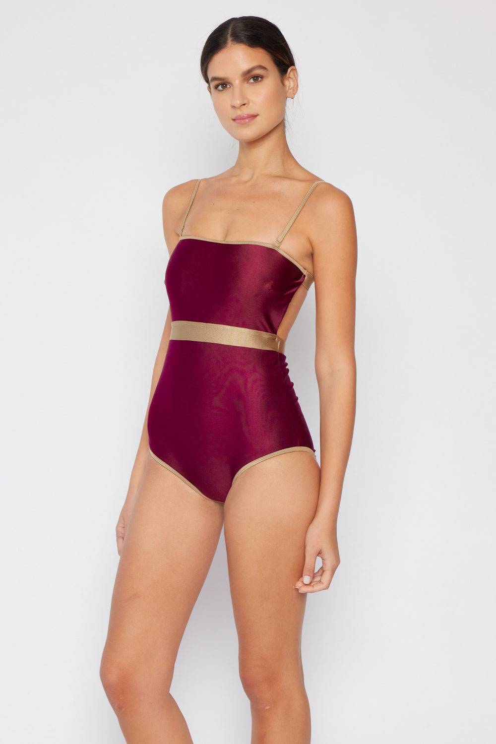 Marina West Swim Wave Break Contrast Trim One-Piece swimsuit in wine with open-back detail and contrast waistband.