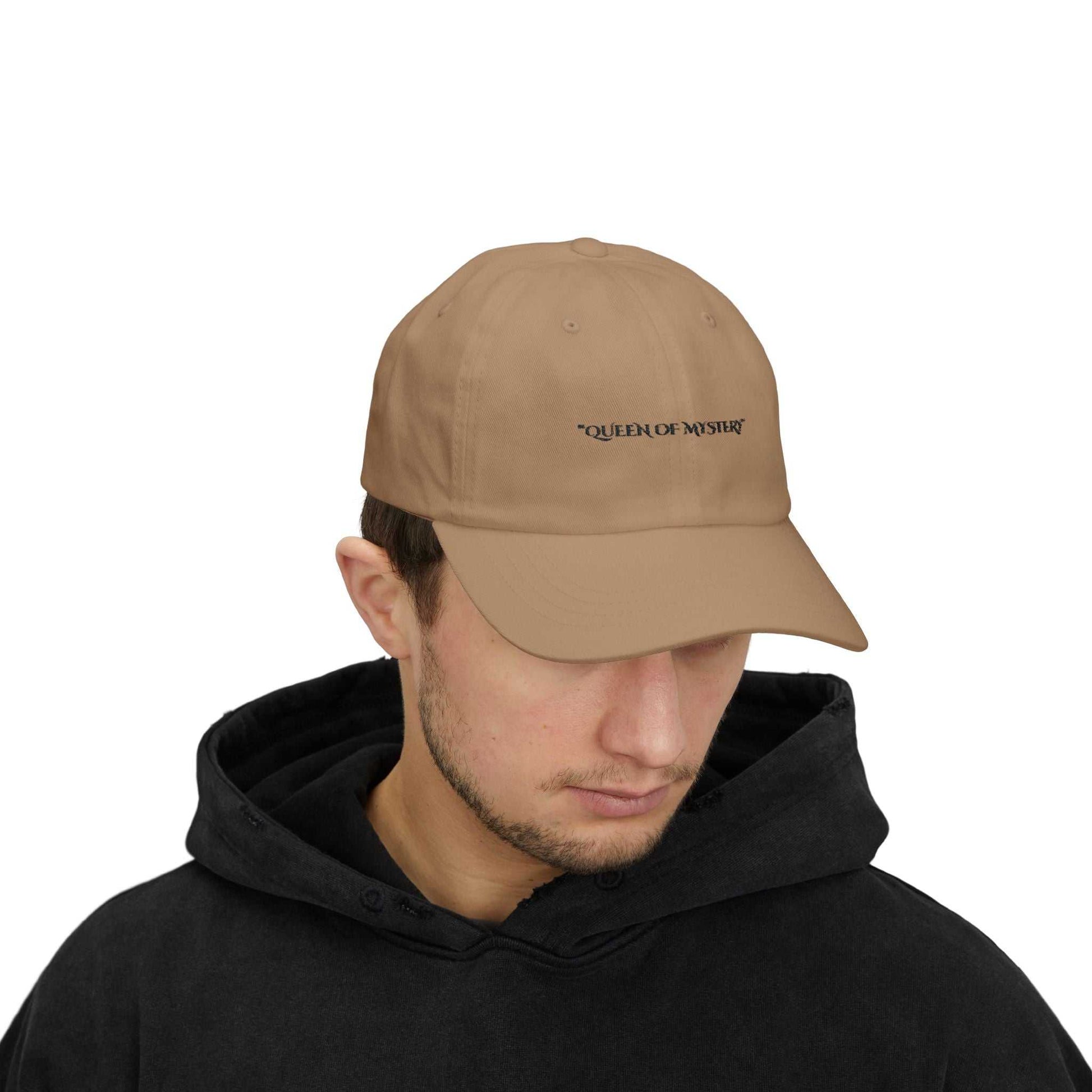 Classic Dad Cap with 'Queen of Mystery' embroidery, brown color, 6-panel structure, precurved visor.