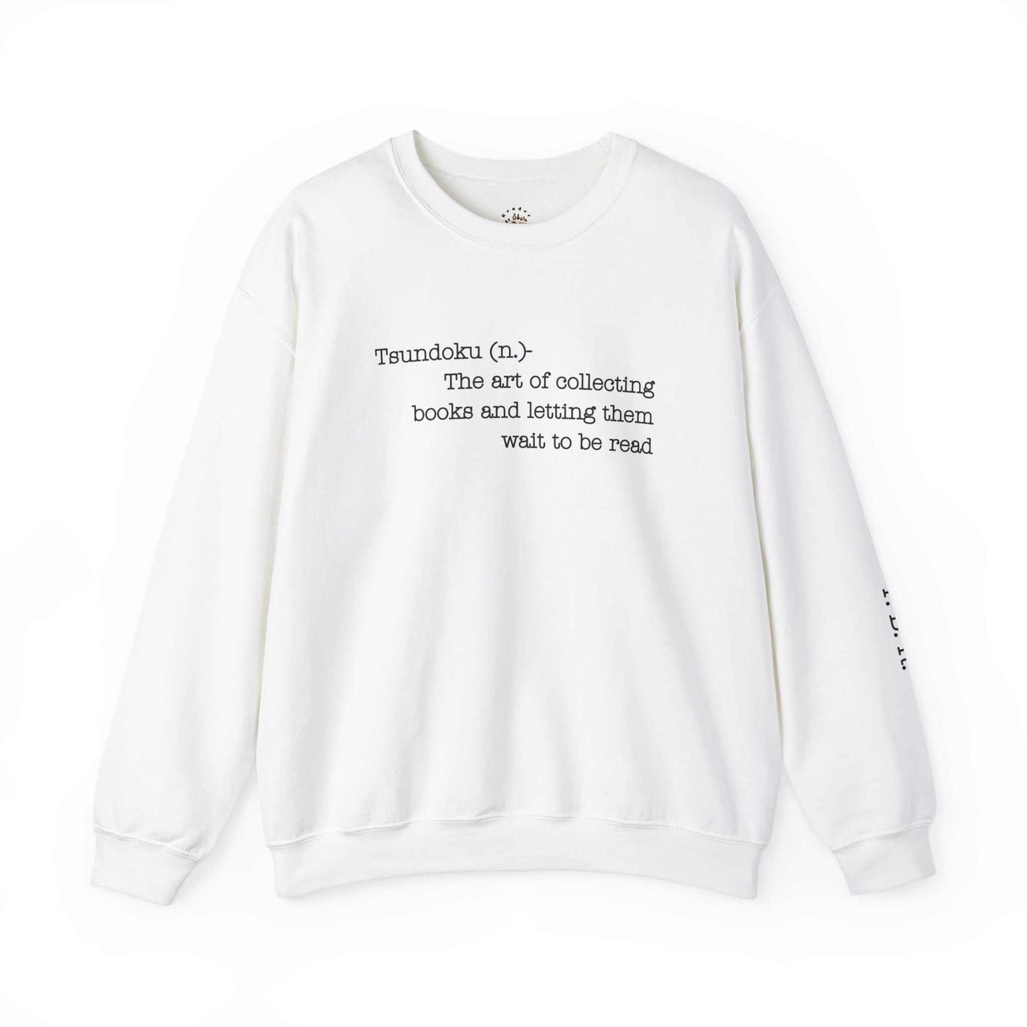 "Tsundoku" crewneck sweatshirt with book-collecting definition, ideal for avid readers.