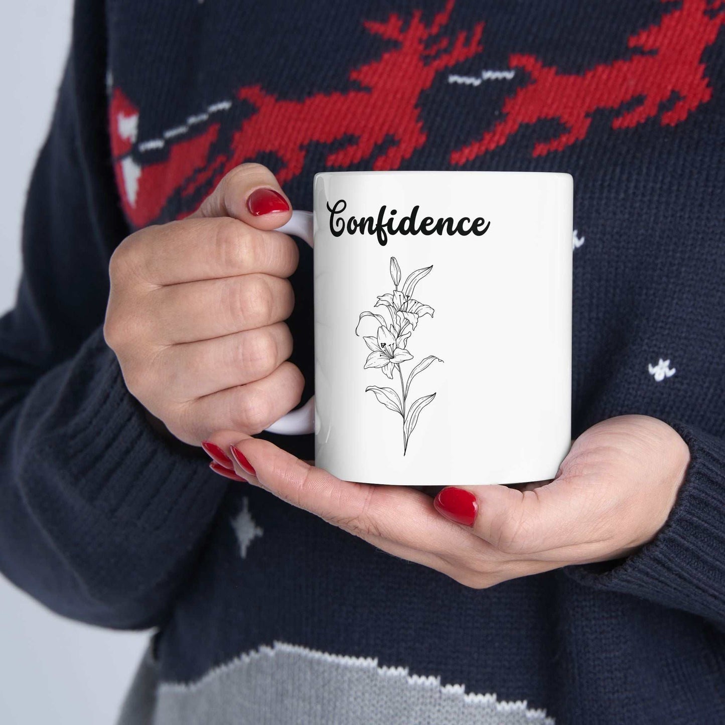 Ceramic mug with confidence lily design, glossy finish, microwave and dishwasher safe, available in 11oz and 15oz.