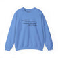 Tsundoku crewneck sweatshirt in blue with "The art of collecting books" definition printed on the front.