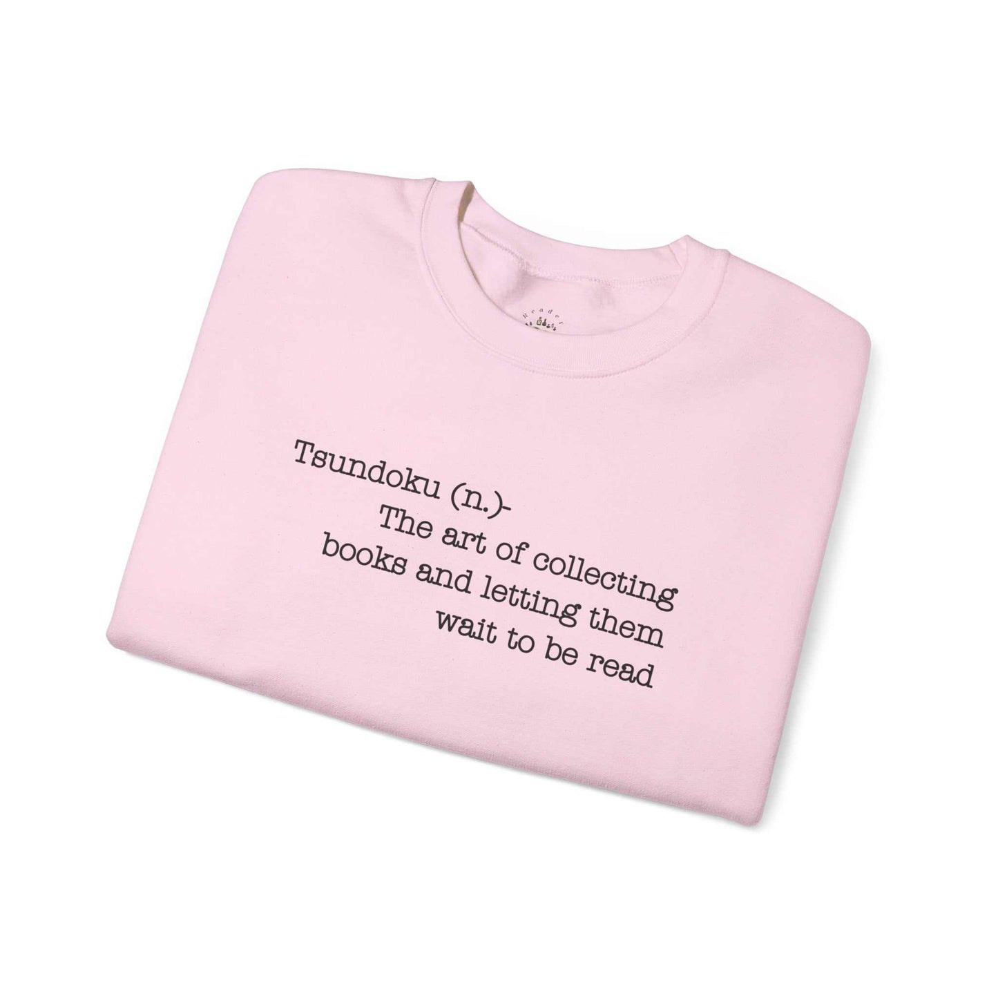 Tsundoku crewneck sweatshirt with book definition print, ideal for avid readers.