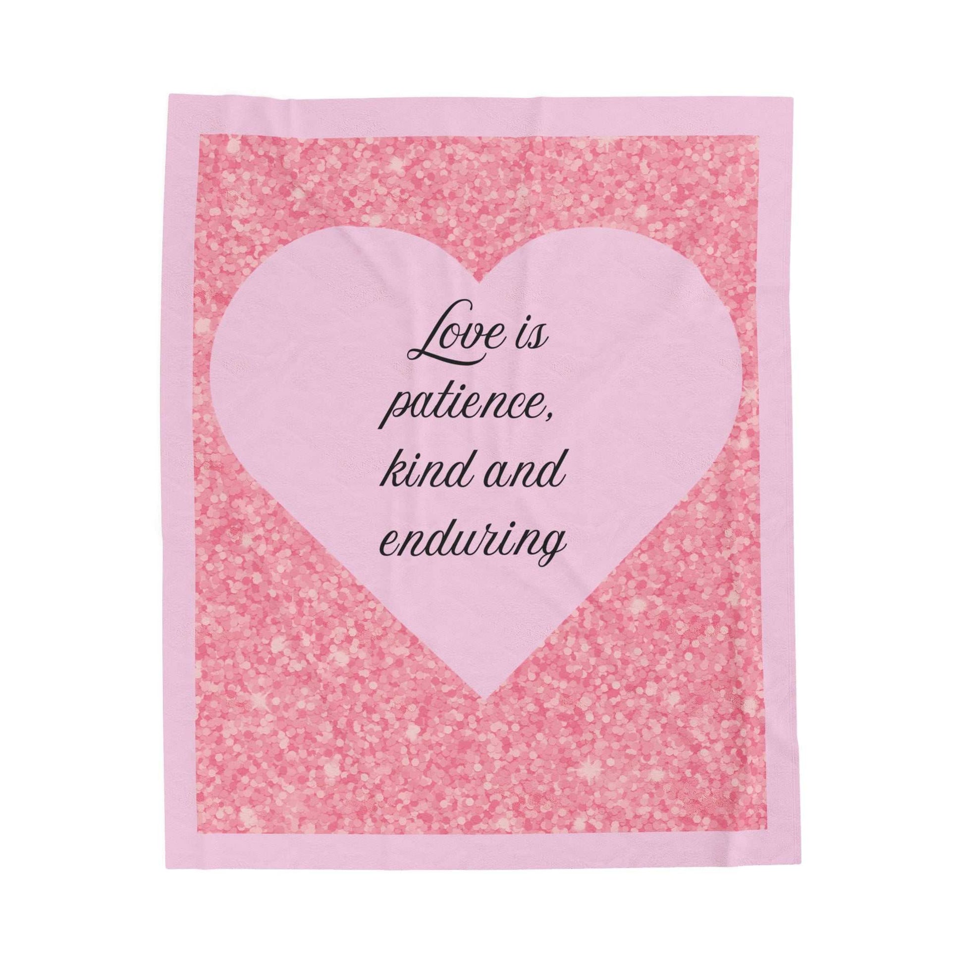 Plush blanket with pink heart and glitter design, featuring "Love is patience, kind and enduring."