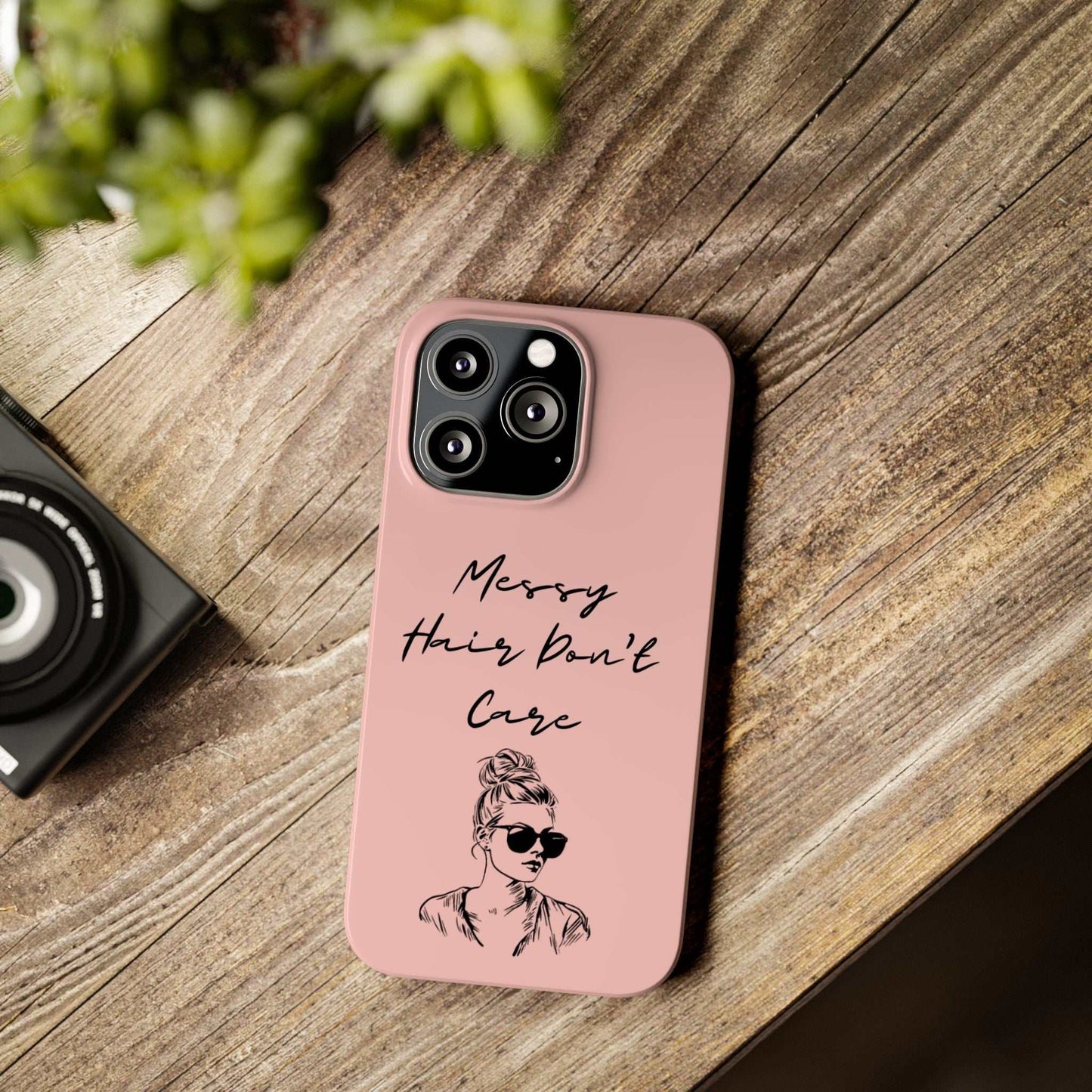 Baby pink phone case with 'Messy Hair, Don't Care' quote and girl illustration.