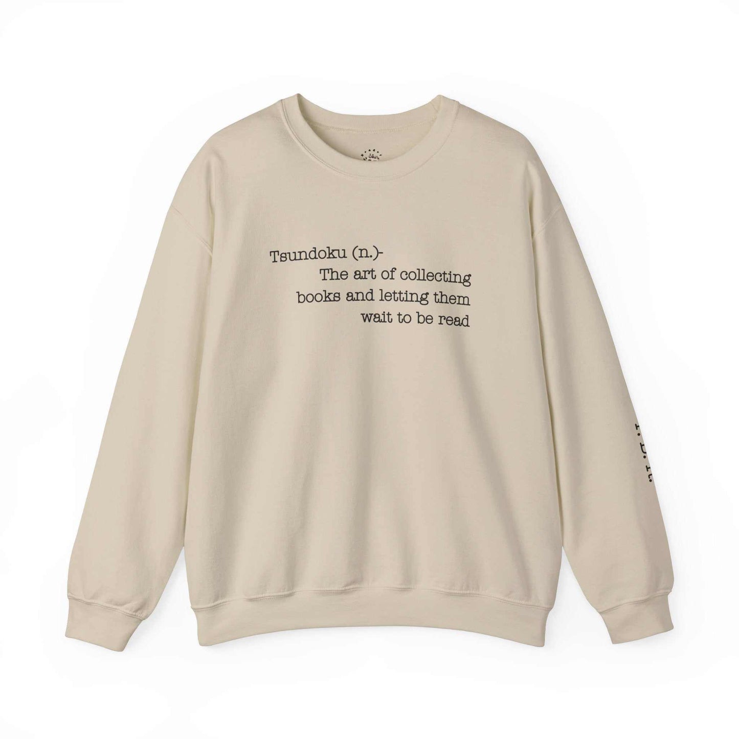 "Tsundoku" crewneck sweatshirt with book collecting definition on front, perfect for avid readers.