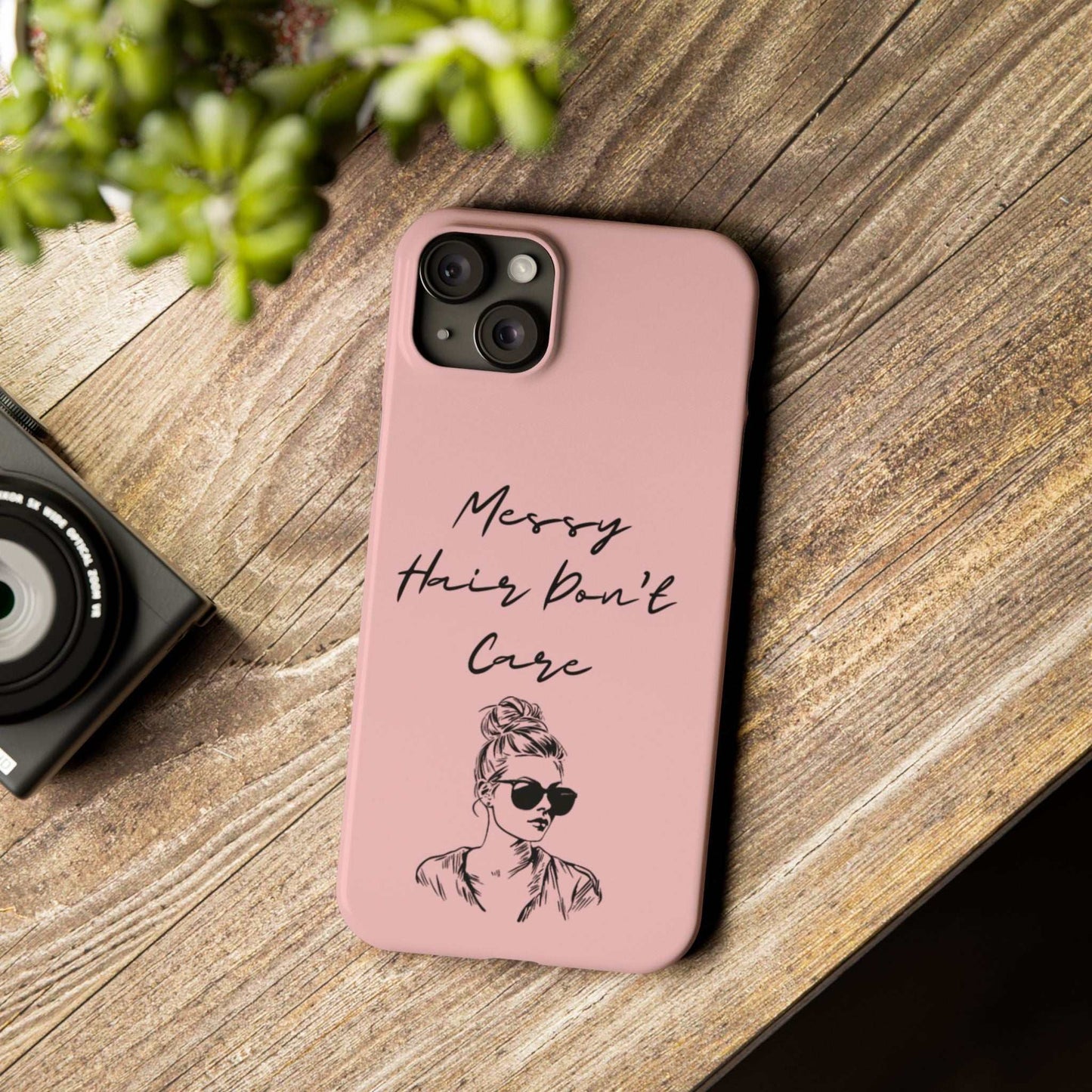 Baby pink phone case with "Messy Hair, Don't Care" quote and trendy design.