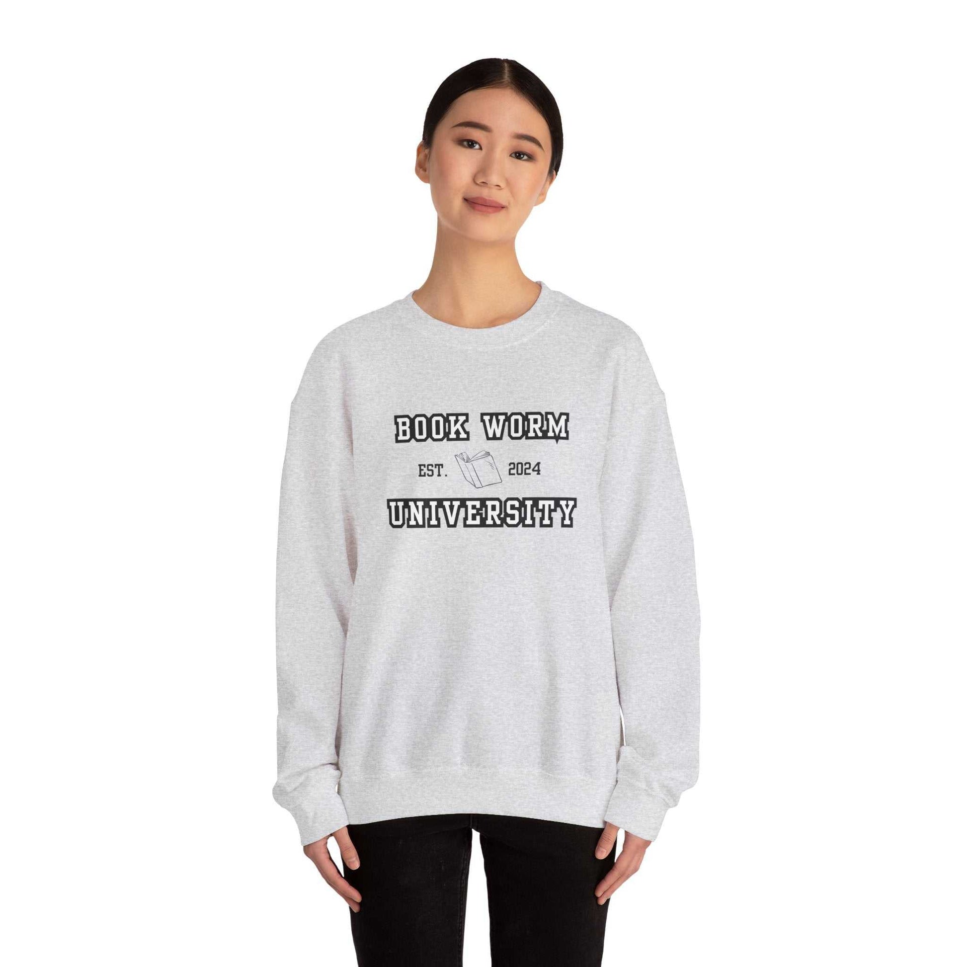 Bookworm University Crewneck Sweatshirt - Est 2024 printed design, cozy cotton-polyester blend, worn by model.