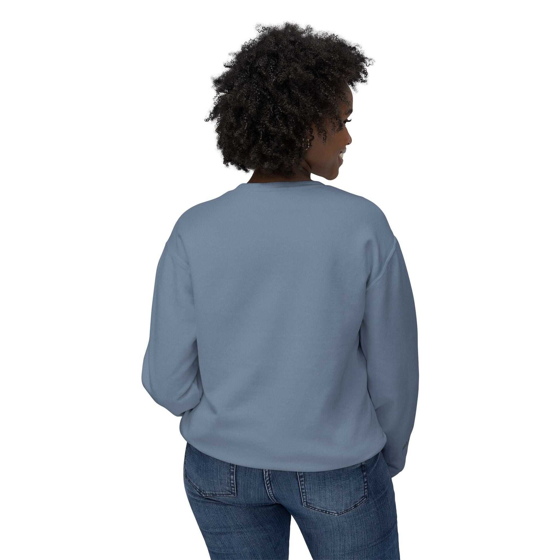 Back view of woman wearing Queens Mystery Sweatshirt, showcasing its relaxed fit and seamless design.