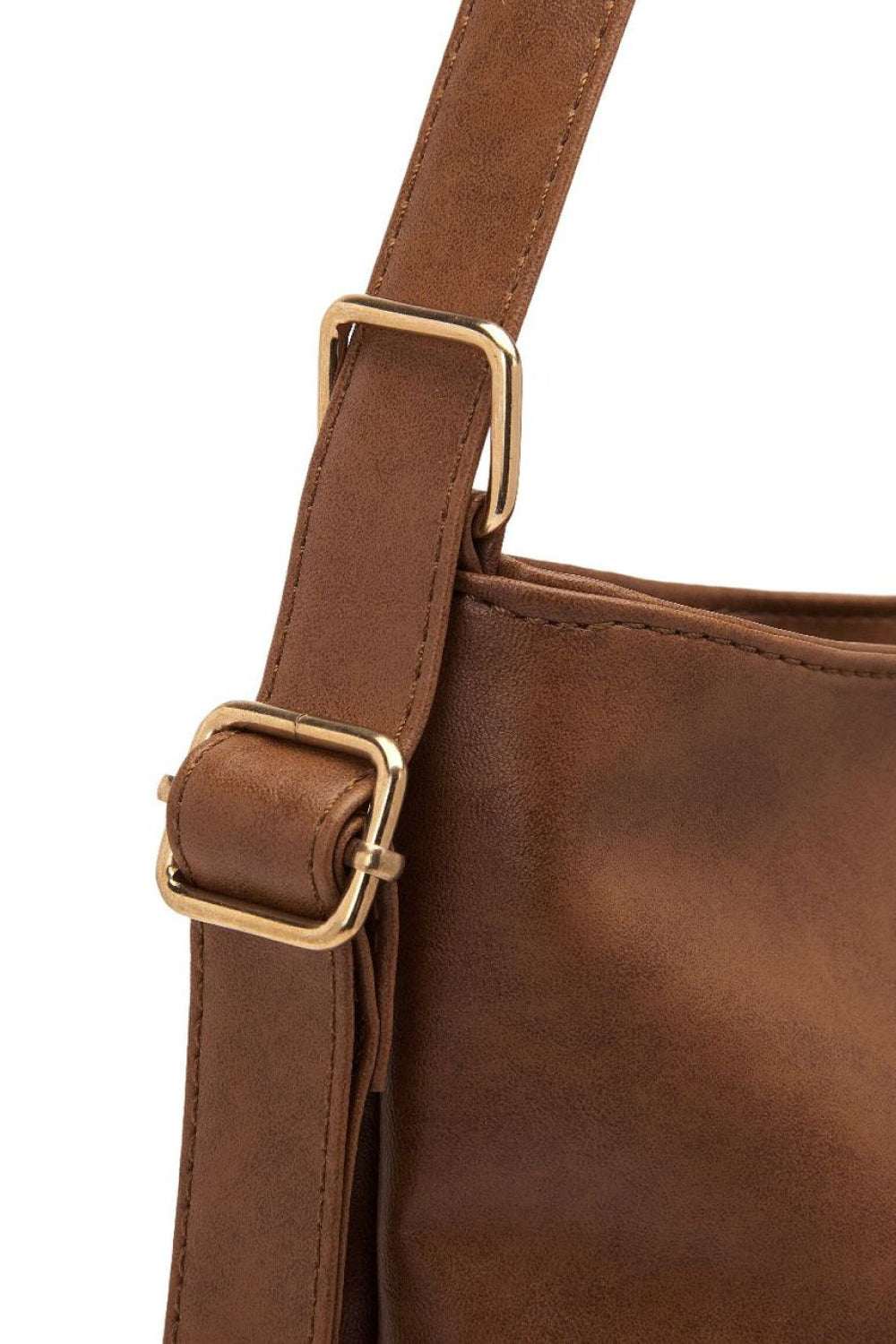 Large PU leather crossbody bag with adjustable strap in brown.