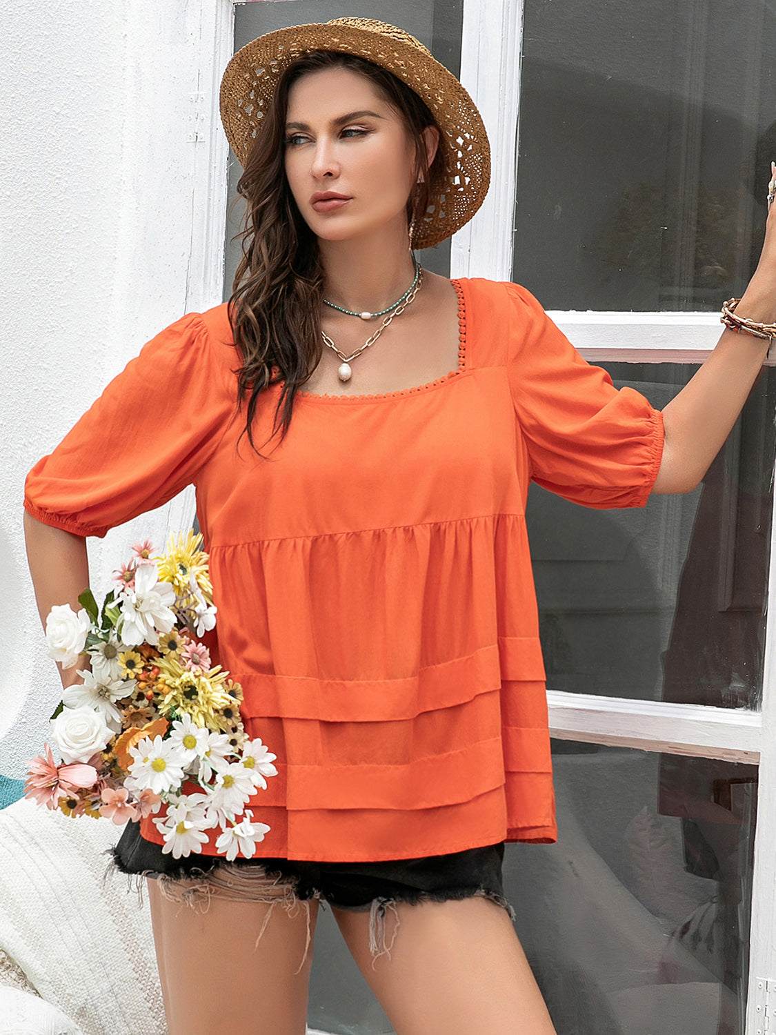 Plus size square neck half sleeve orange blouse with ruched design.