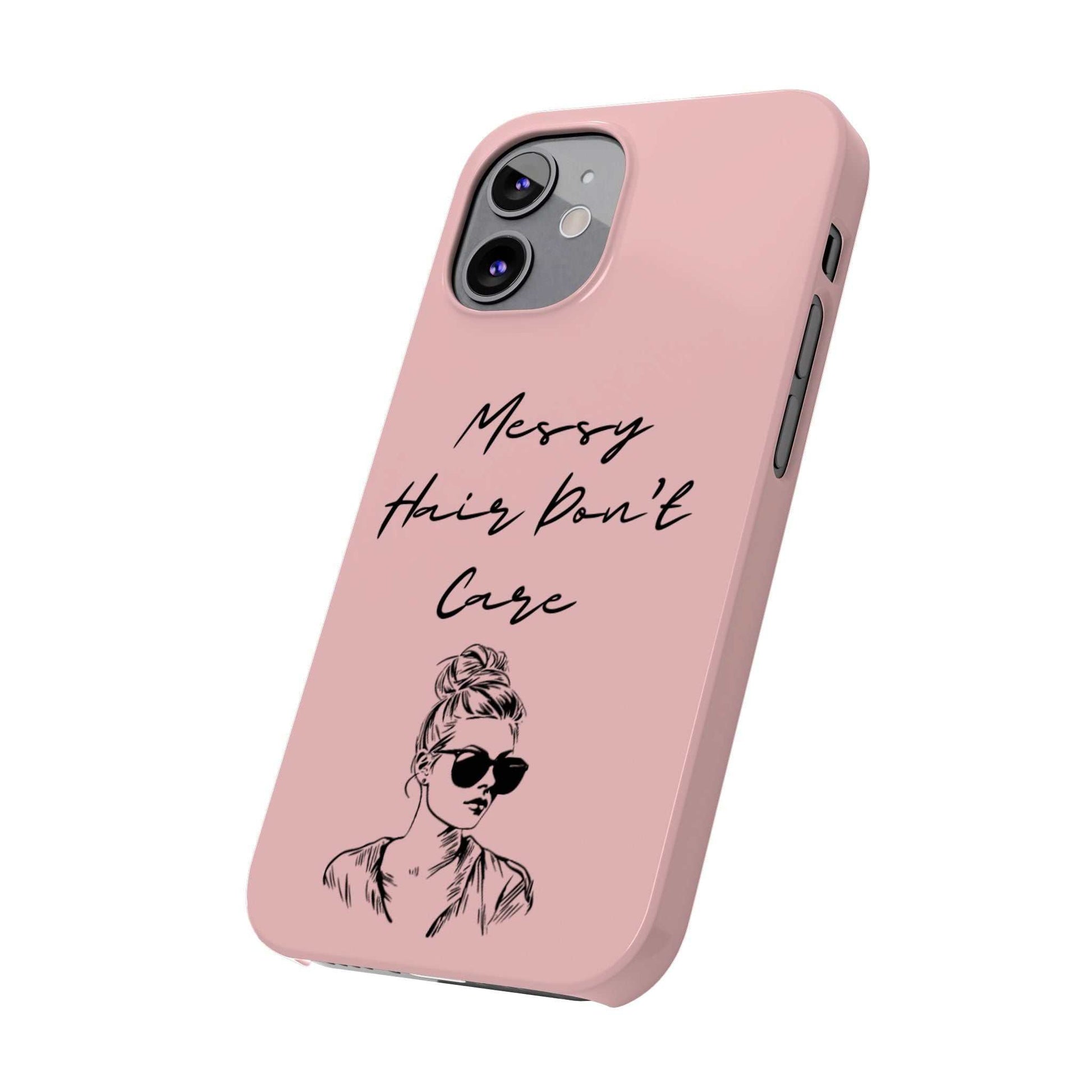 Baby pink phone case with "Messy Hair, Don't Care" quote and girl illustration, trendy and stylish accessory.