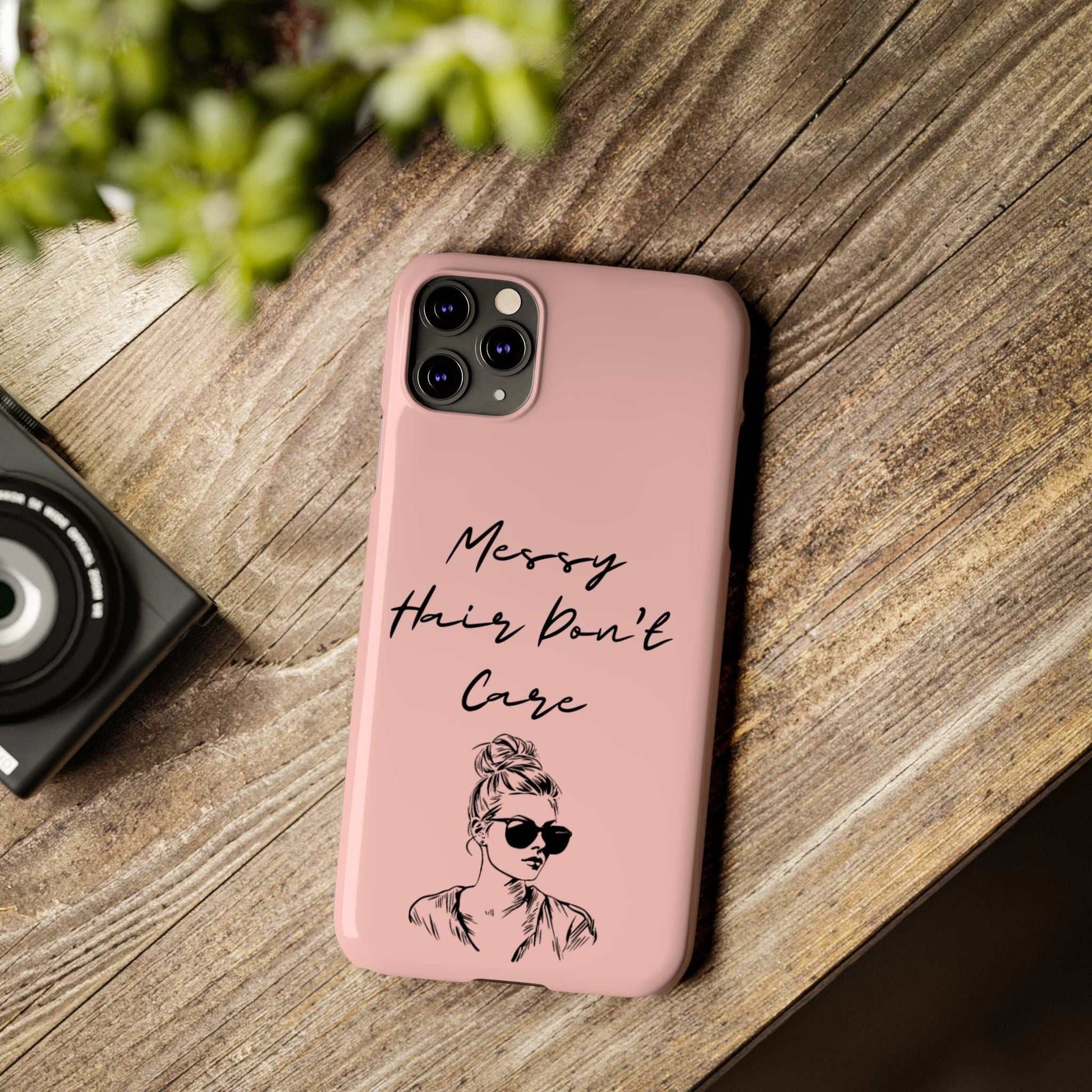 Baby pink phone case with "Messy Hair, Don't Care" quote and girl illustration, trendy and durable design.