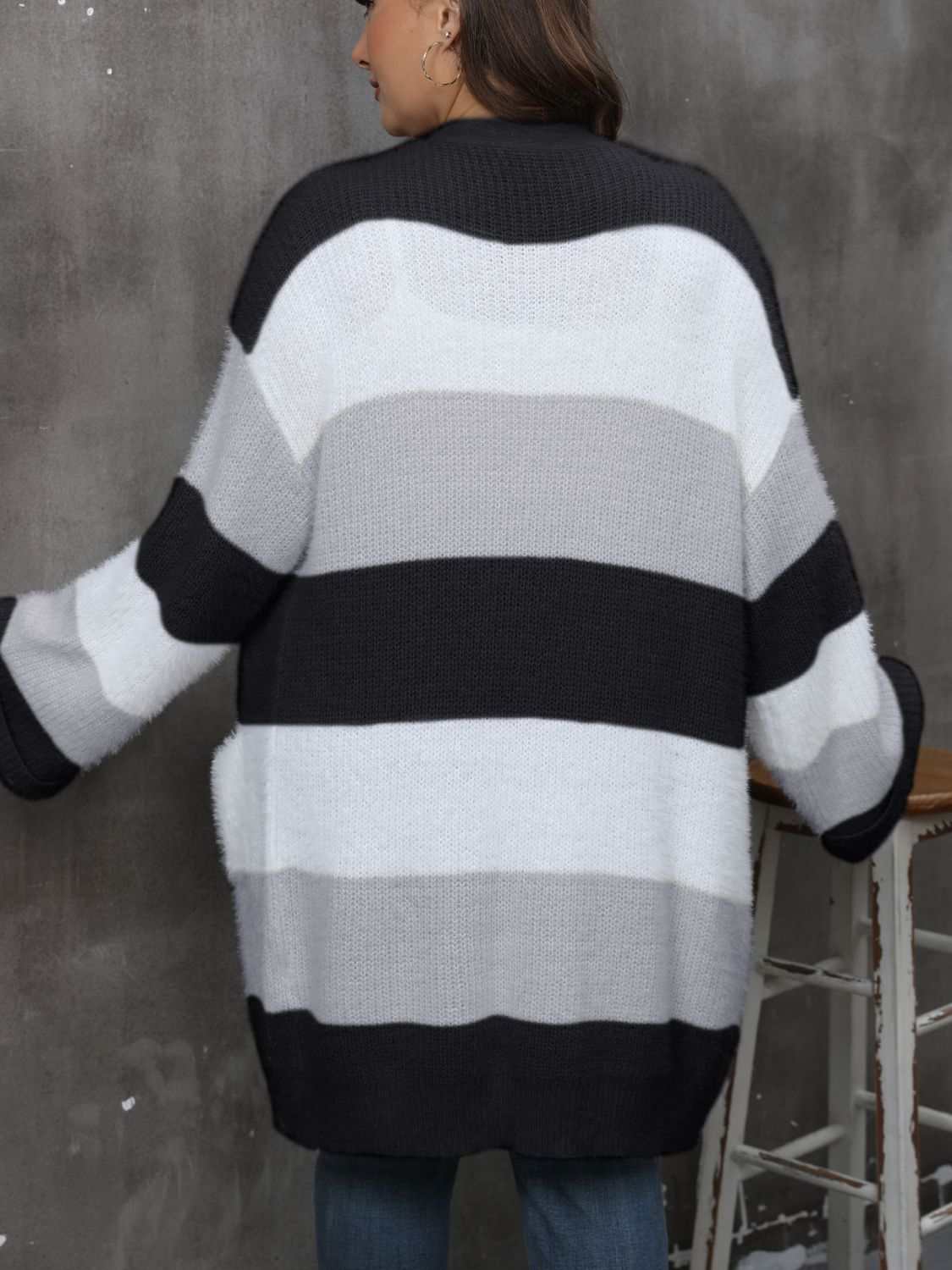 Plus size open front long sleeve cardigan with black, gray, and white stripes.