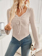 Ribbed drawstring long sleeve t-shirt, slightly stretchy, in beige color.