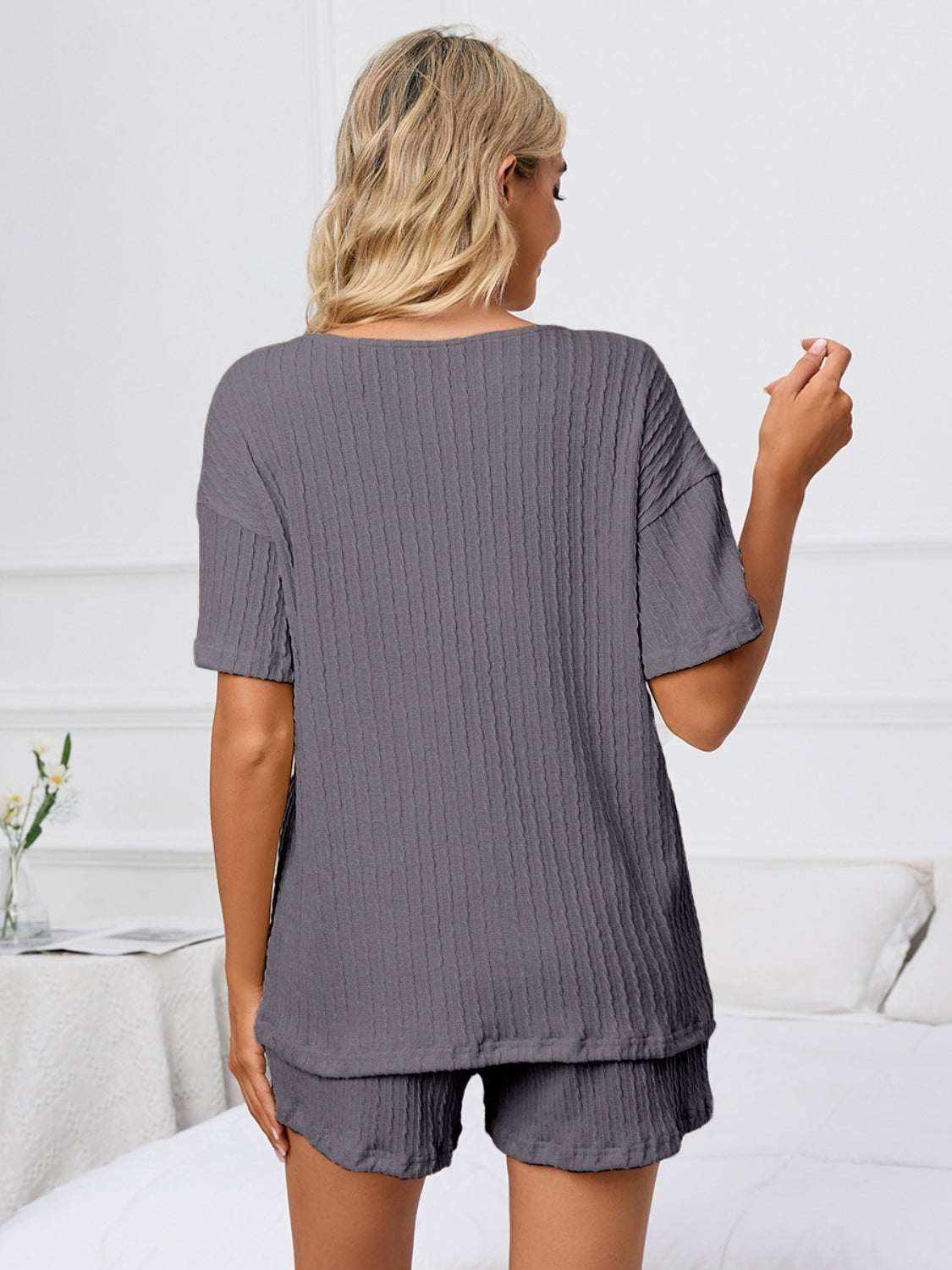 Notched short sleeve and shorts lounge set in grey, ribbed texture.