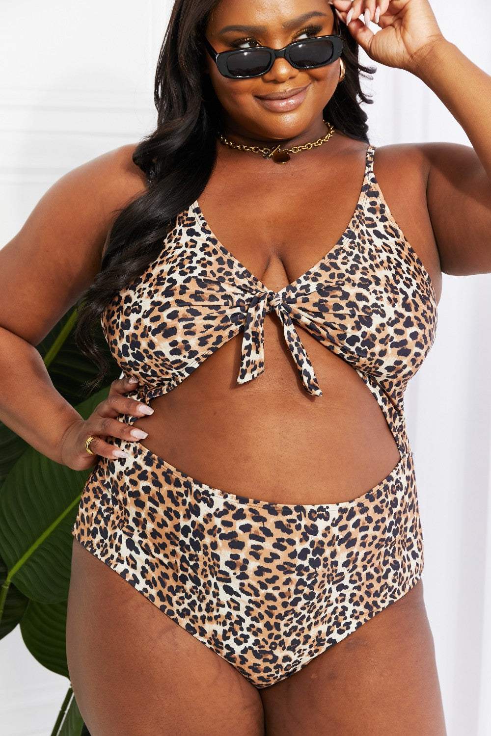 Leopard print cutout one-piece swimsuit with plunging neckline from Marina West Swim.