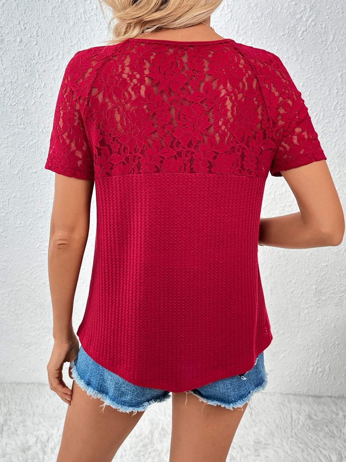 Ivy Lane Lace Detail V-Neck Short Sleeve T-Shirt in red with moderate stretch and lace accents.