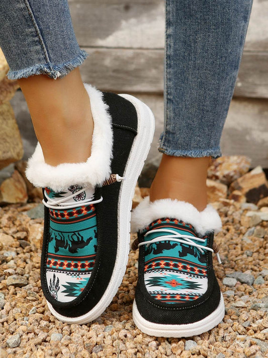 Colorful printed round toe flat slip-ons with faux fur lining.