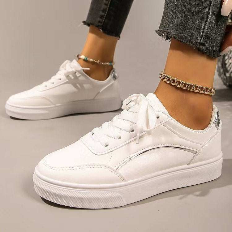 PU Leather Round Toe Flat Sneakers with rubber sole.