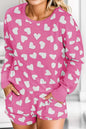 Heart print round neck lounge set with top and shorts in pink.