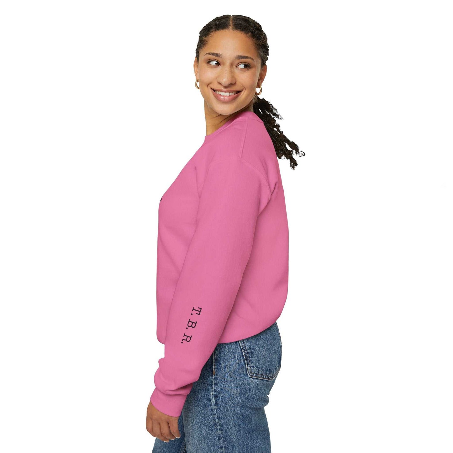 Pink Tsundoku crewneck sweatshirt with T.B.R. initials on sleeve, ideal for book lovers.