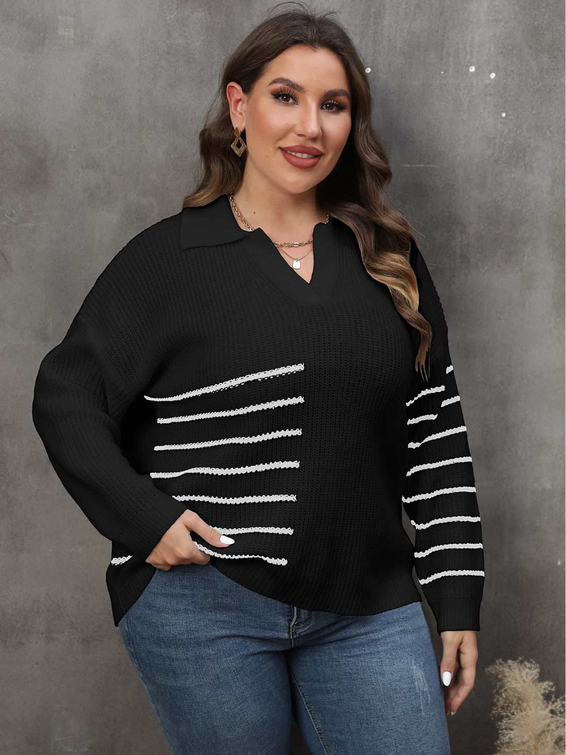 Plus size striped V-neck sweater with long sleeves.