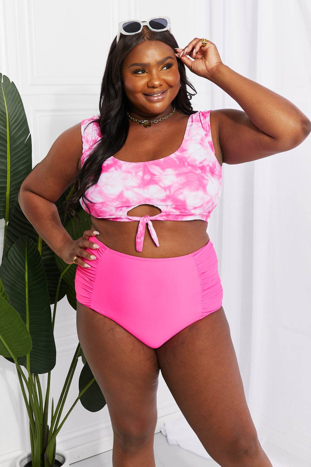 Pink tie-dye crop swim top with thick straps and ruched high-waist bottoms, featuring a retro tie detail by Marina West Swim Sanibel.