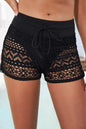 Full size drawstring waist swim shorts with lace detail, moderate stretch, solid pattern, beach style.