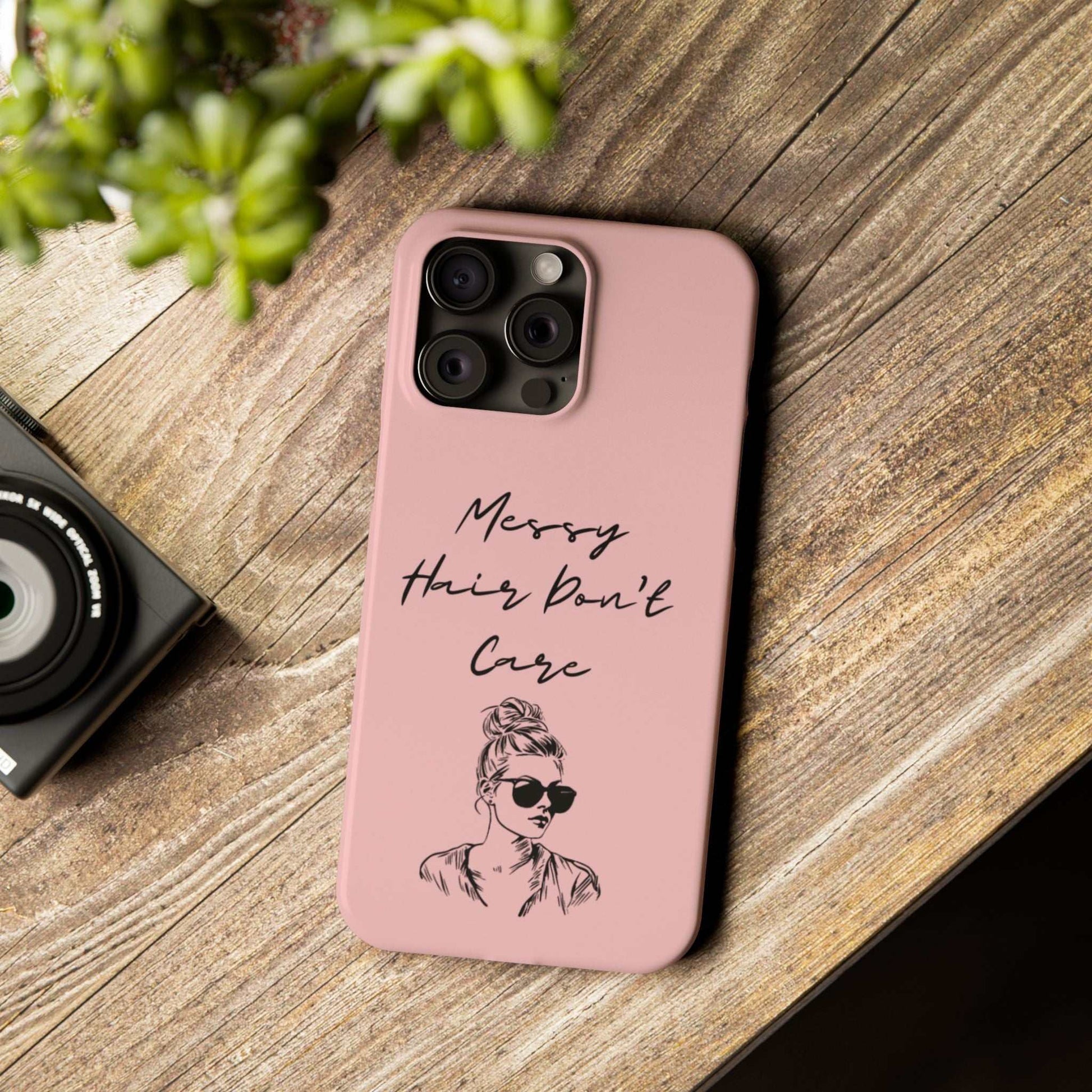 Baby pink phone case with "Messy Hair, Don't Care" quote, featuring a girl in sunglasses and messy bun.