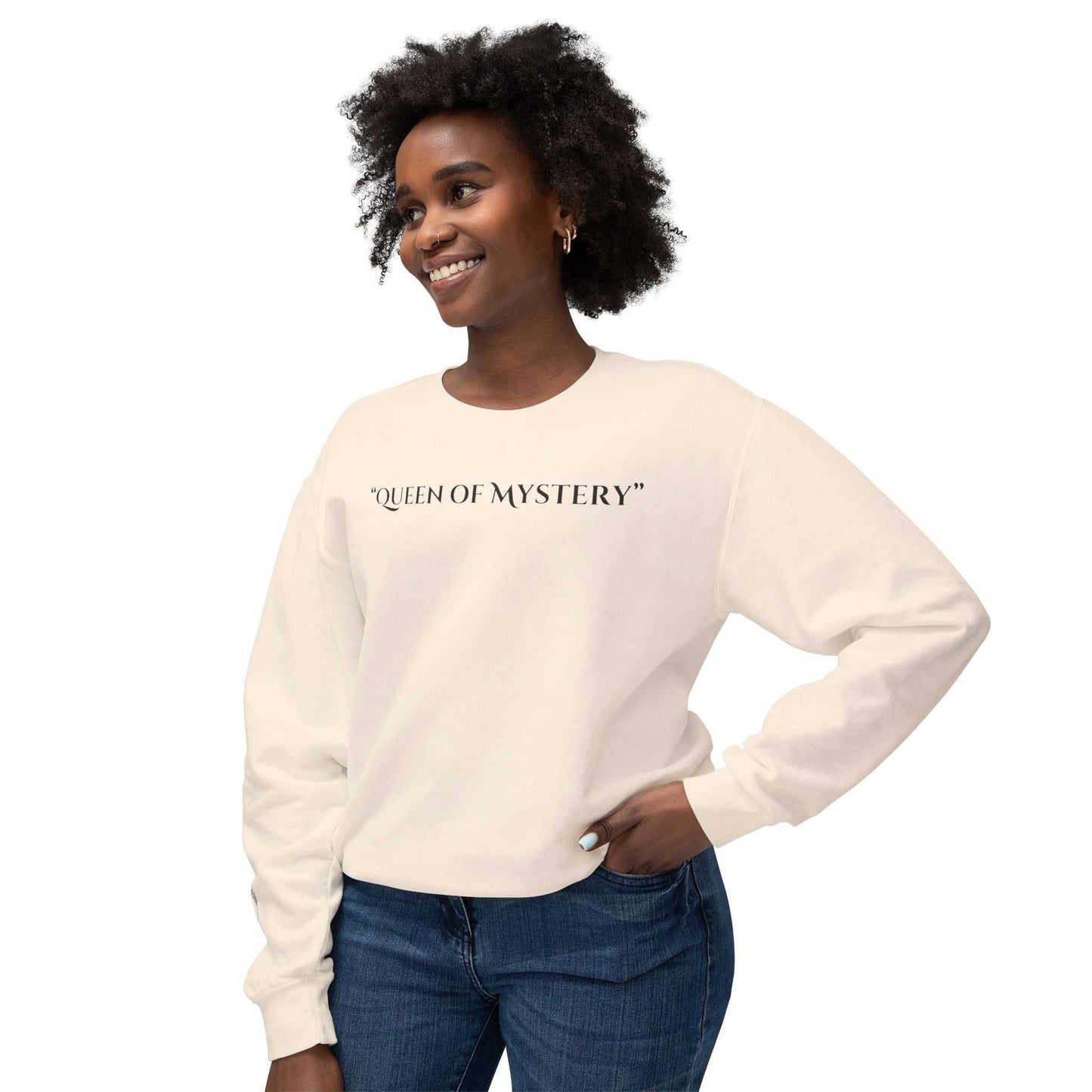 Queens Mystery Sweatshirt with enigmatic design, worn by smiling person, ideal for casual wear.