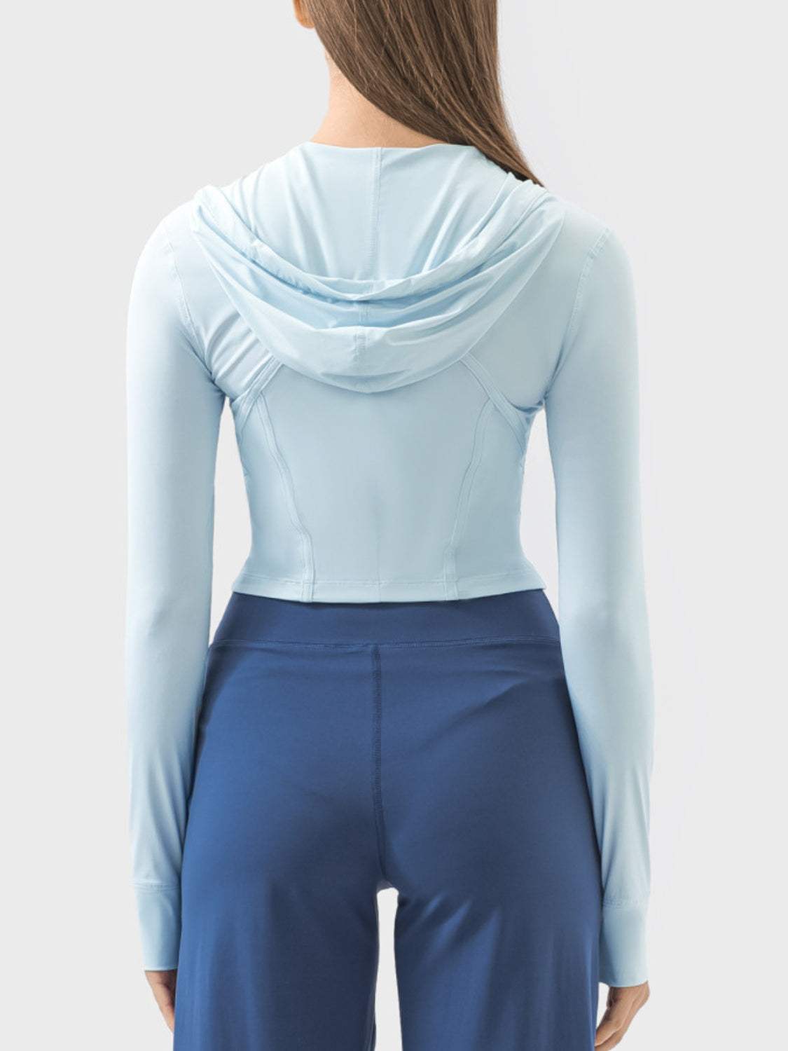 Light blue hooded long sleeve active outerwear, nylon spandex blend.