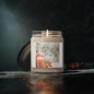 Luxury scented soy candle from Securing Secrets Boutique LLC in reusable glass vessel.