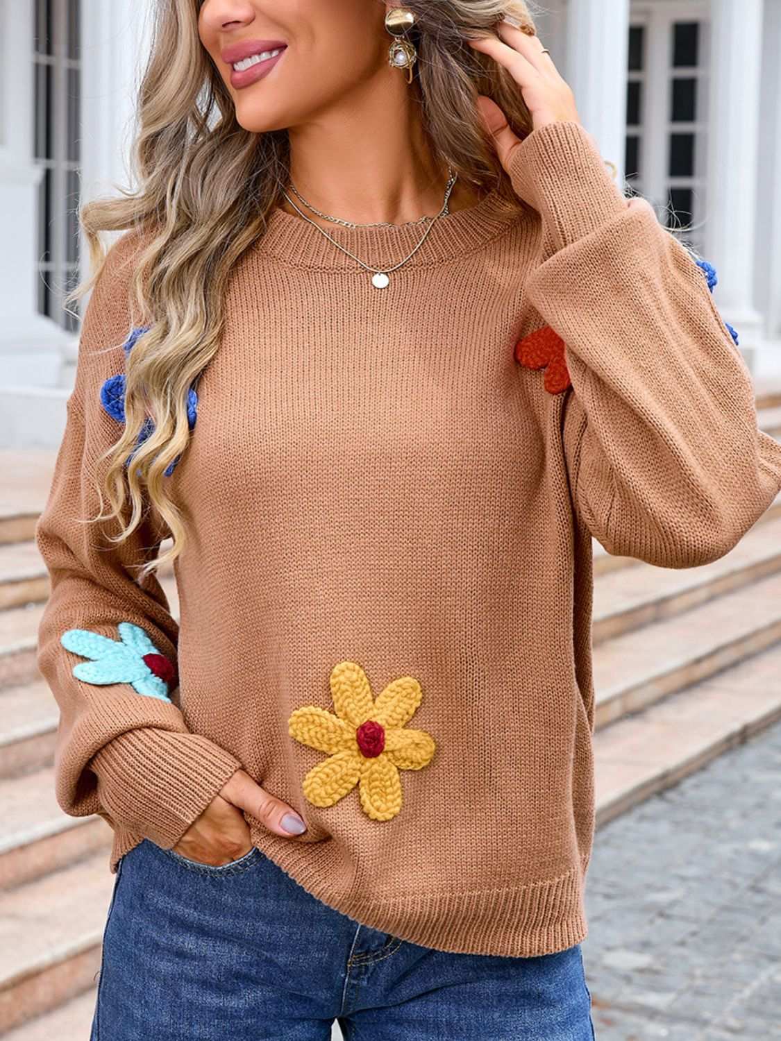 Angel Wings Crochet Flower Round Neck Sweater with colorful flower accents, moderate stretch, 100% acrylic.