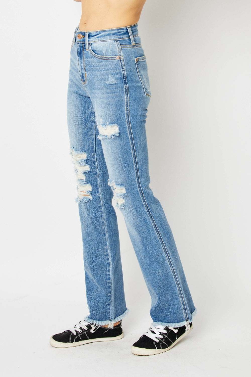 Judy Blue full size distressed raw hem bootcut jeans with moderate stretch.