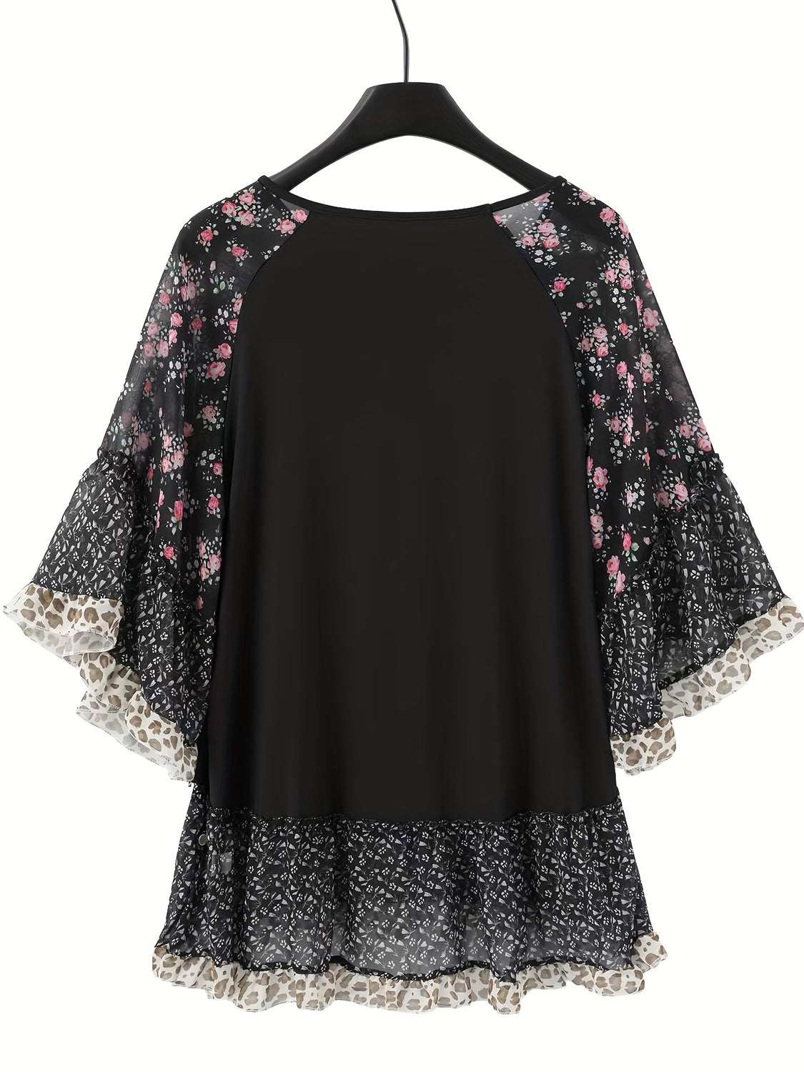 Full size frill printed round neck half sleeve blouse in black with floral pattern, made of polyester.