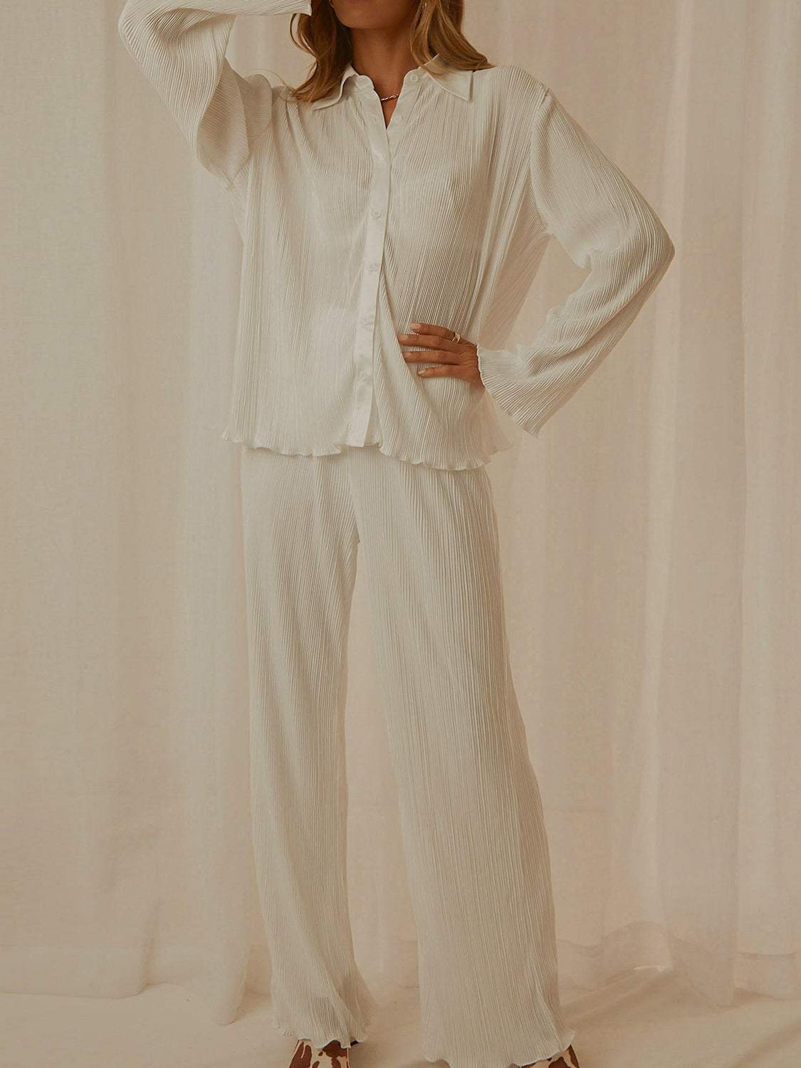 Collared neck long sleeve top and pants lounge set in white, buttoned, opaque, made of 100% polyester.