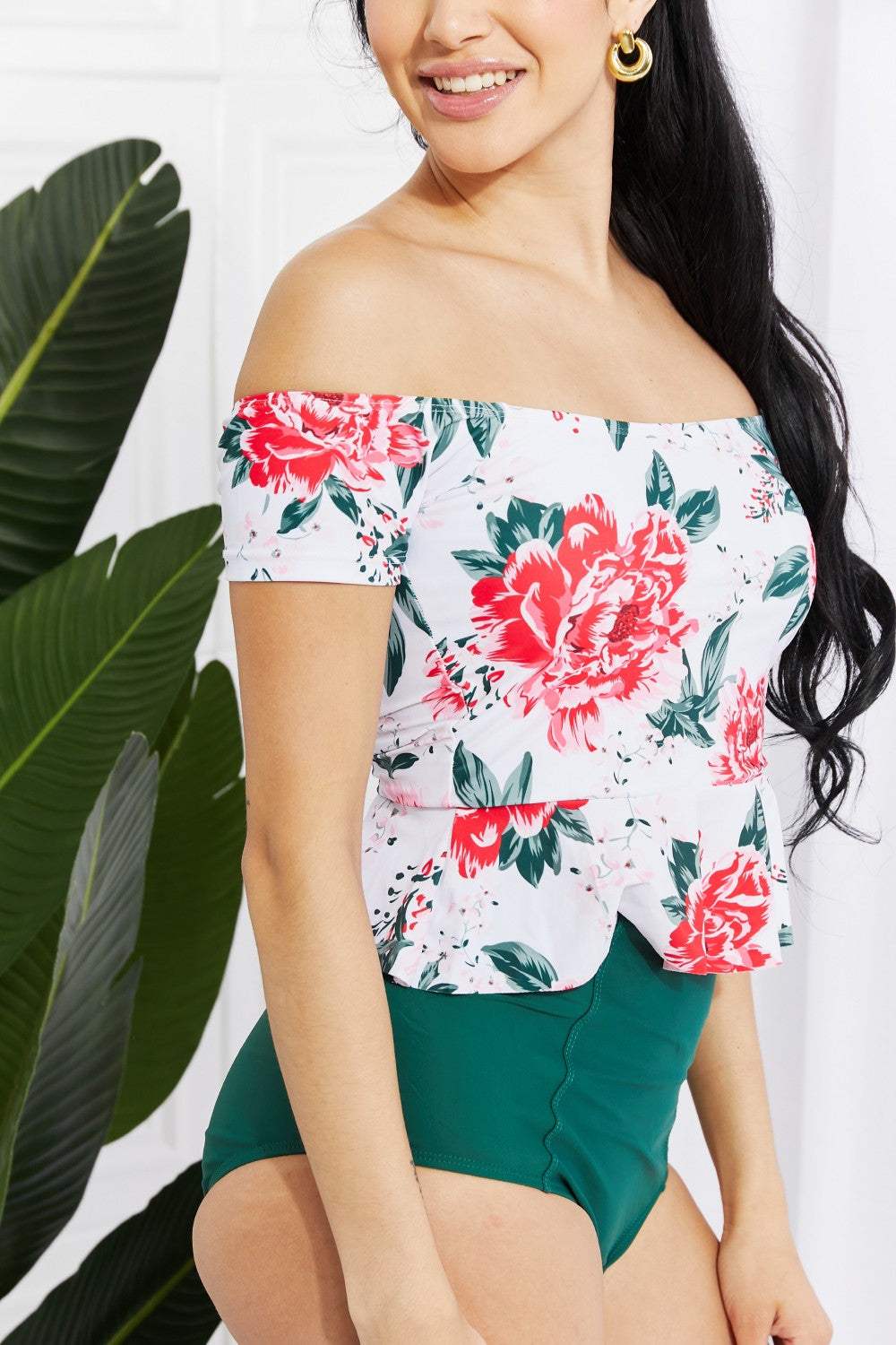 Marina West Swim Coastal Cutie off-shoulder floral tankini set with high-waisted green bottoms.